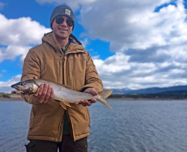 Ryan Jones with 'eater' size lake trout at Granby