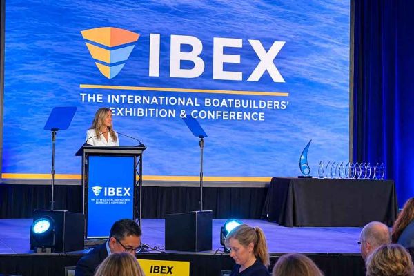 1_IBEX-261006 Show director Mary Velline gave opening remarks at this morning's industry breakfast. DAVID CONWAY PHOTO