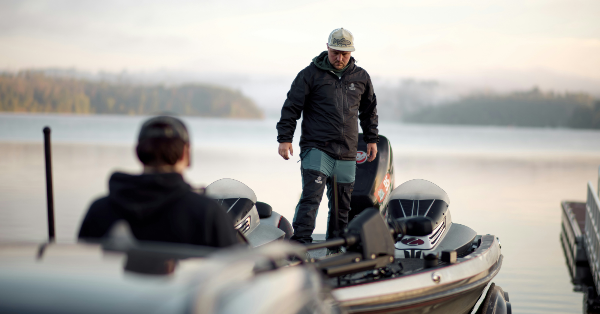 two men in a bass fishing boat