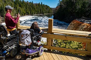 The Daverts enjoy the view from Upper Falls platform Thursday.