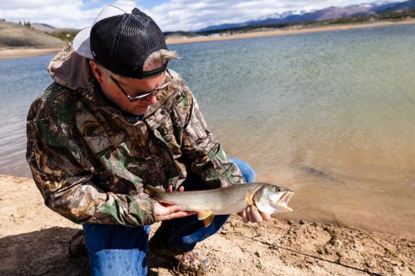 Jerry Neal with 'eater' size lake trout at Granby